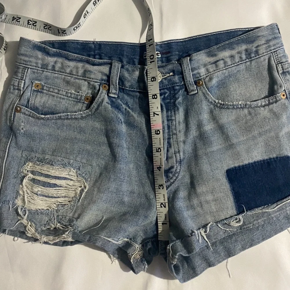 BDG High Rise Button Fly Distressed & Patched Tomgirl Jean Shorts